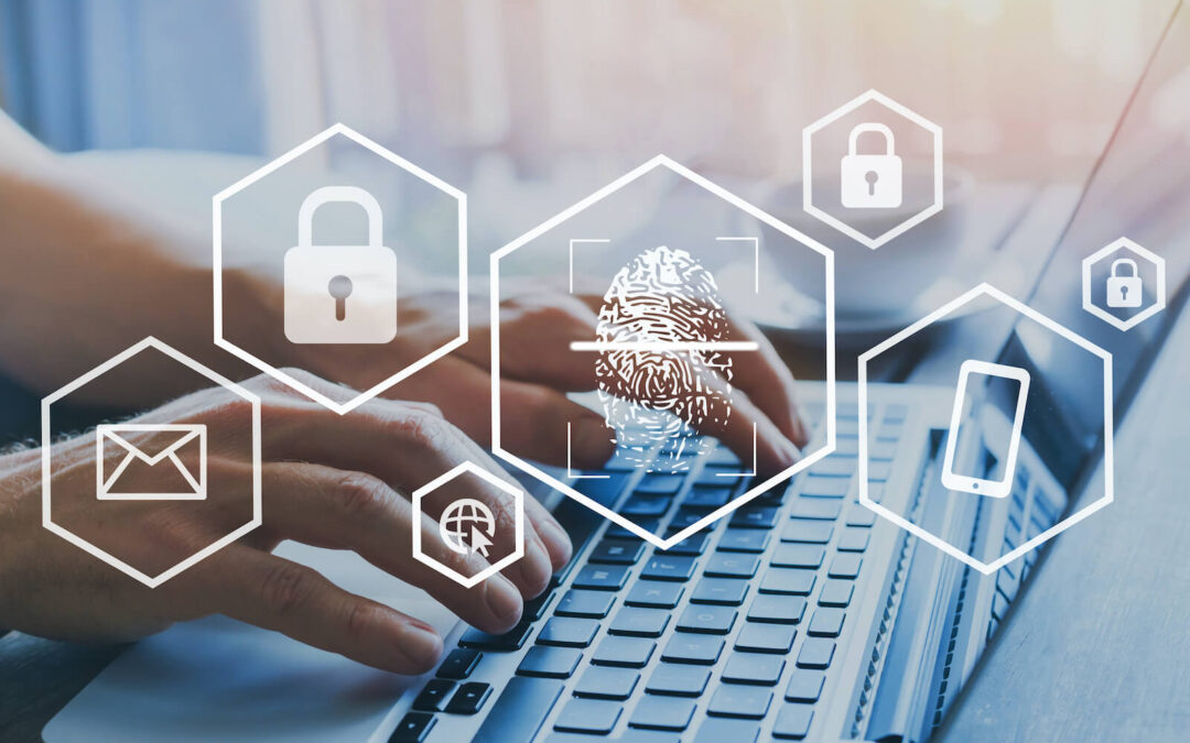 Person typing on a laptop keyboard overlayed with white padlock icons representing online security.