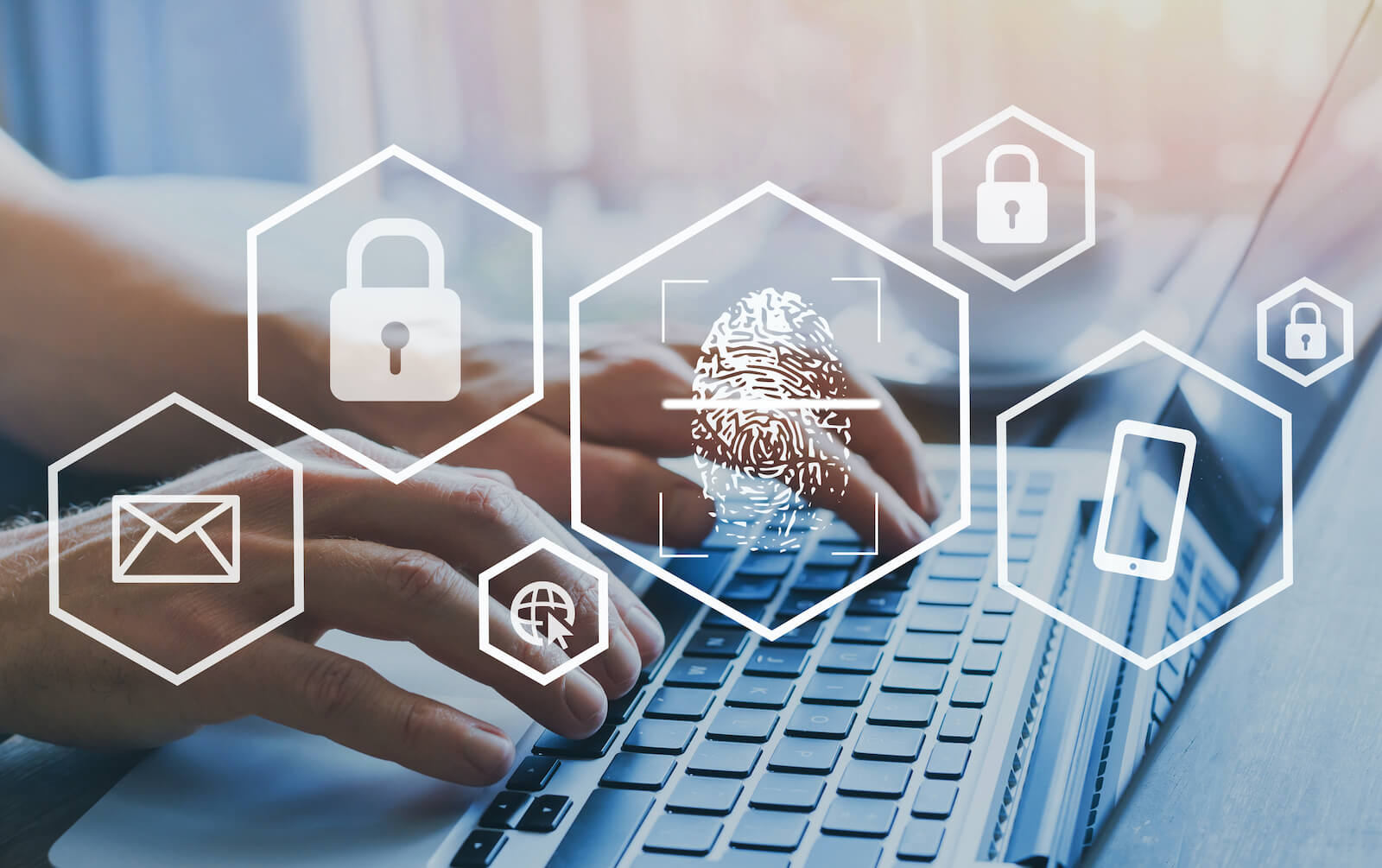 Person typing on a laptop keyboard overlayed with white padlock icons representing online security.