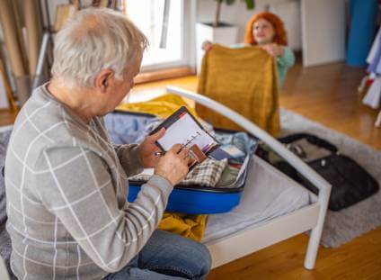 Couple returning from vacation travel concerned about a scam.