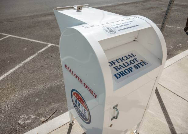 A secure U.S. election Official Ballot Drop Site container used to avoid election scams.